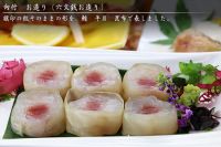 ■向付　お造り（六文銭お造り）旗印の紋そのままの形を、鮪、平目、昆布で表しました。